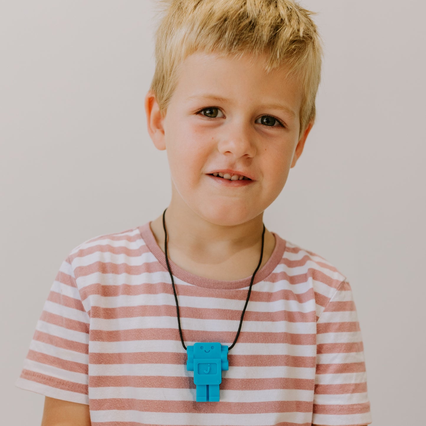 Chew pendants, bands and pencil toppers